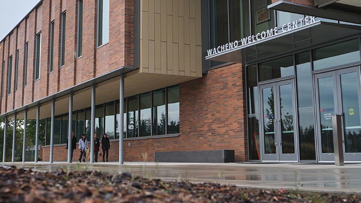 Students walk past Welcoming Center