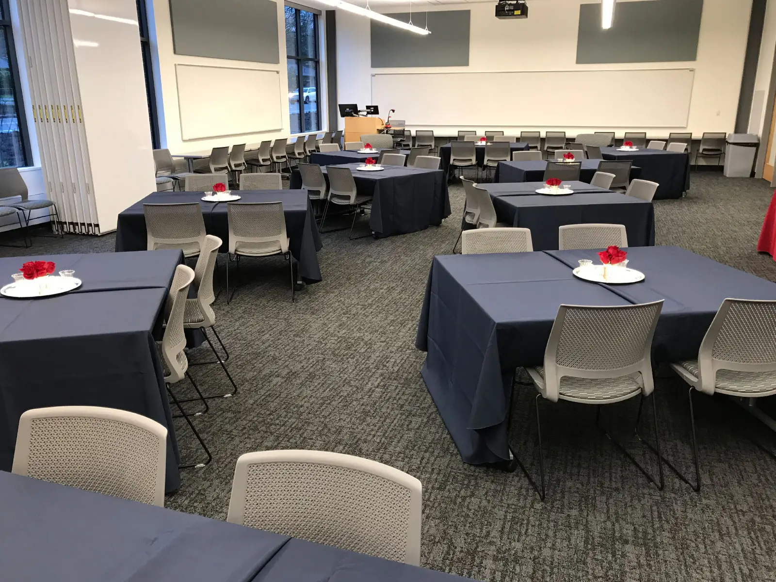 Decorated tables and centerpieces in Harmony Campus community room