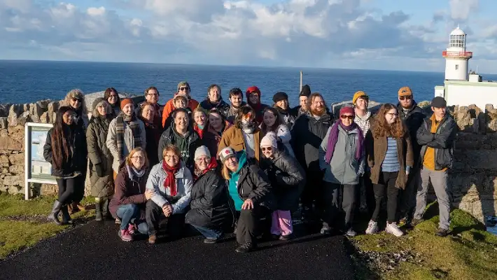 Students gathered on Ireland's cliffs